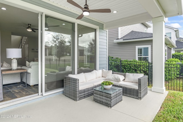 view of patio featuring ceiling fan and an outdoor living space