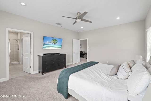 carpeted bedroom featuring ceiling fan and connected bathroom