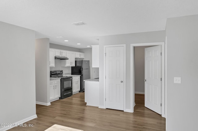 kitchen with black appliances, light stone countertops, dark hardwood / wood-style floors, and white cabinets