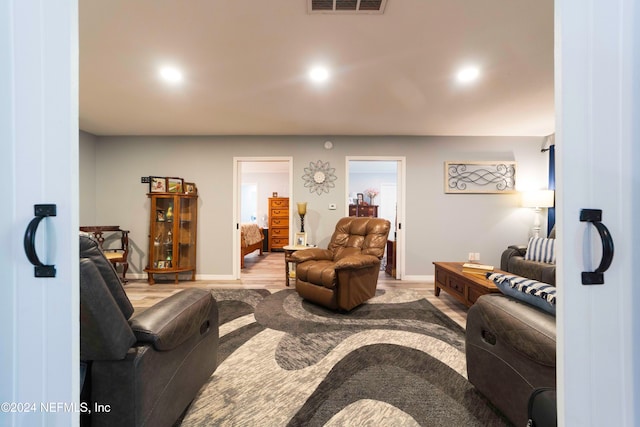 living room with light hardwood / wood-style flooring