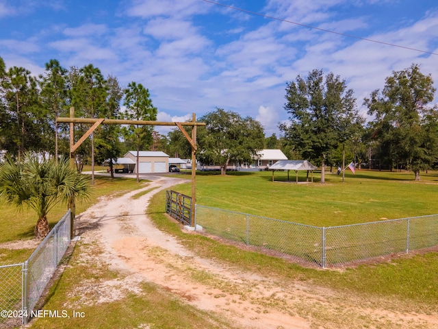 view of home's community featuring a lawn