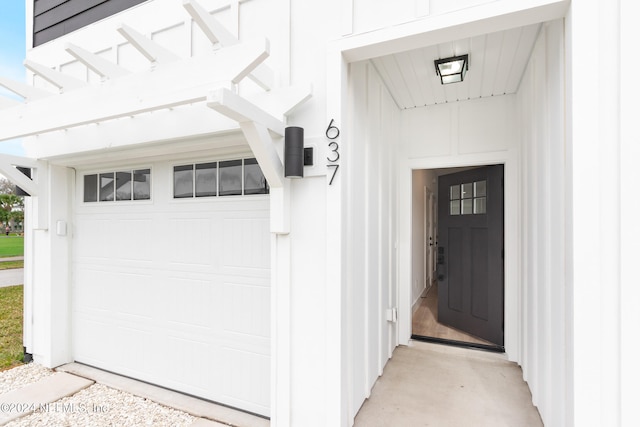 property entrance featuring a garage