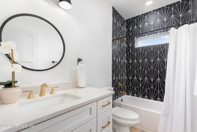 full bathroom with vanity, toilet, and shower / tub combo