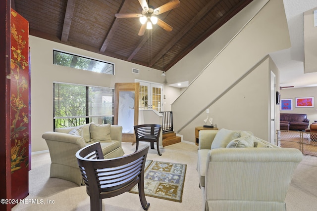 living room with high vaulted ceiling, wood ceiling, and light carpet