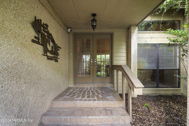 doorway to property featuring french doors