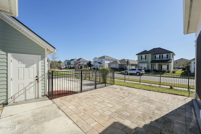 51 Topiary Ave, Saint Augustine, FL 32092 - view of patio featuring a residential view and driveway