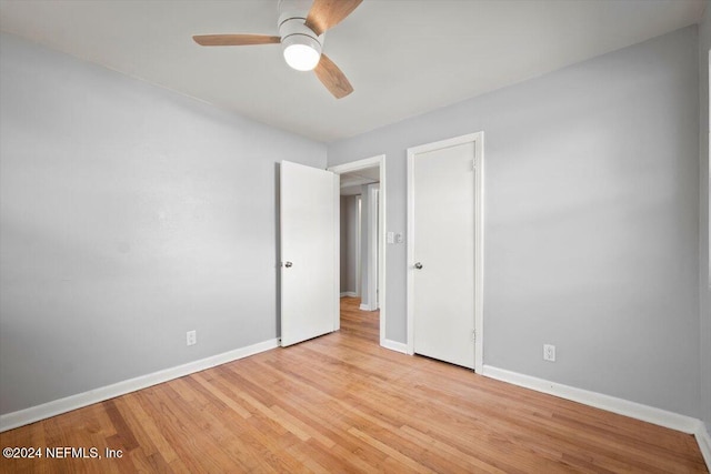 unfurnished bedroom featuring light hardwood / wood-style floors and ceiling fan