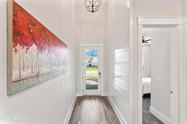 doorway to outside featuring hardwood / wood-style floors and ceiling fan