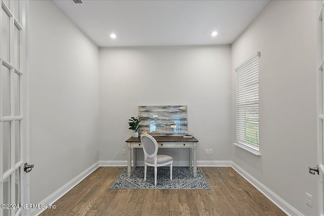 office area featuring dark wood-type flooring