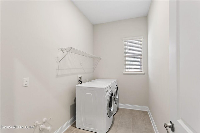 laundry room with washer and dryer