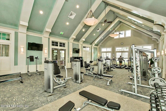 gym featuring high vaulted ceiling, carpet, french doors, and ceiling fan