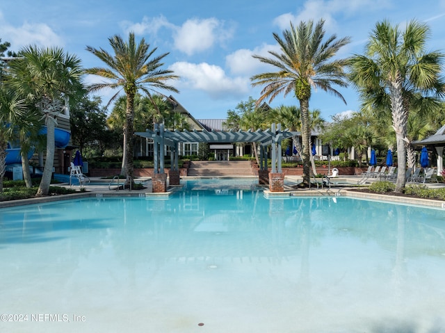 view of pool with a pergola