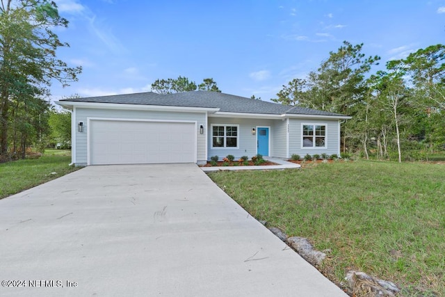 single story home with a garage and a front yard