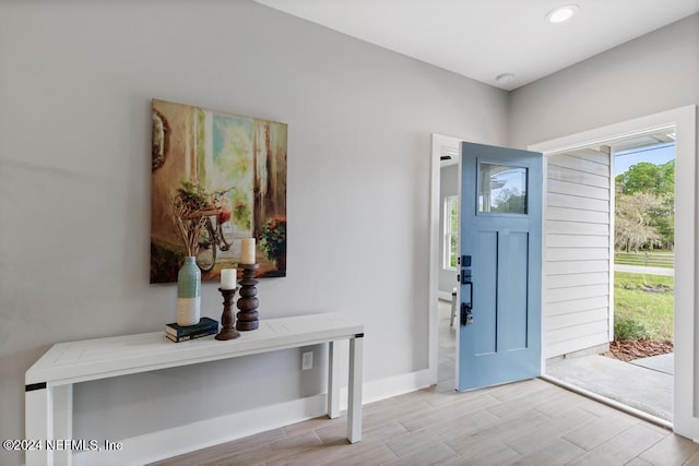 foyer with light hardwood / wood-style flooring