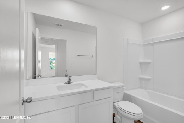 full bathroom featuring vanity, toilet, and shower / bathtub combination