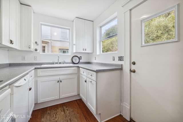 kitchen with white dishwasher, white cabinetry, and dark wood-type flooring