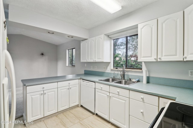 kitchen featuring white cabinetry, sink, white dishwasher, a textured ceiling, and lofted ceiling