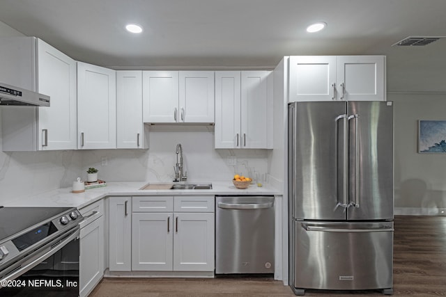 kitchen with white cabinetry, appliances with stainless steel finishes, and sink