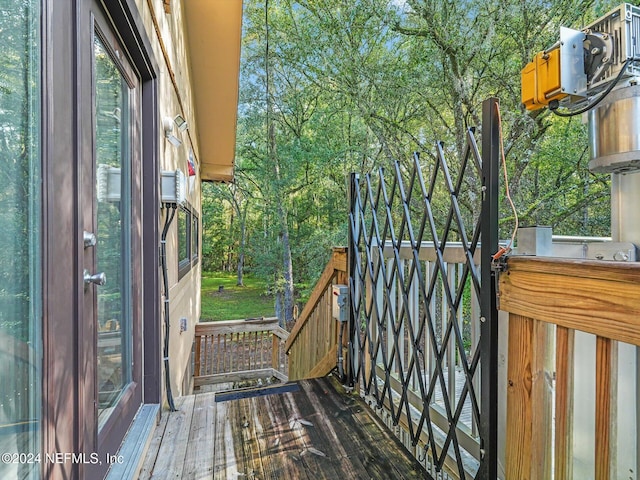 wooden balcony featuring a deck