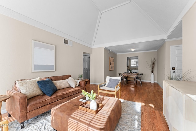 living room featuring ornamental molding, wood-type flooring, and high vaulted ceiling