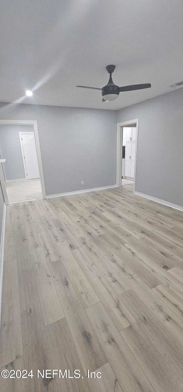 empty room featuring light hardwood / wood-style floors