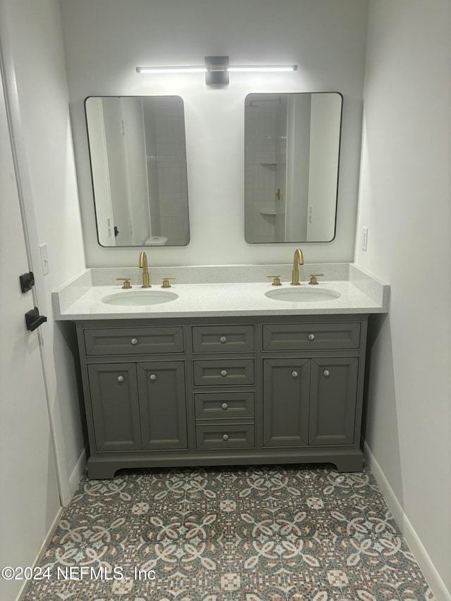 bathroom featuring vanity and tile patterned flooring