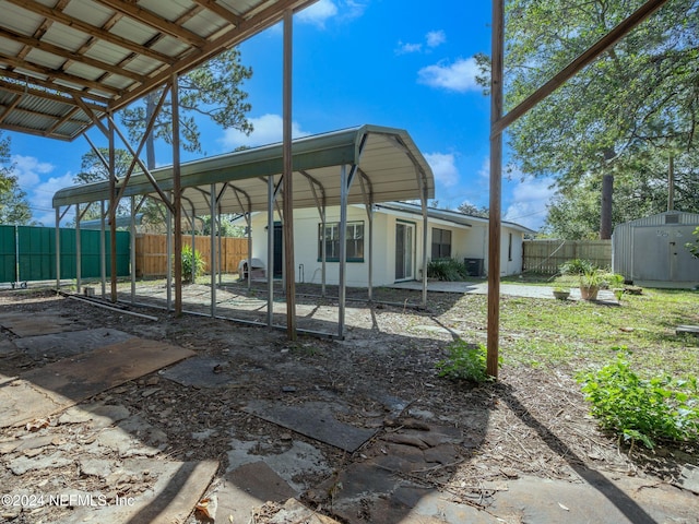 view of patio featuring a shed