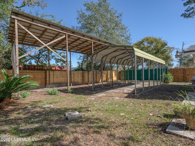 view of car parking featuring a carport