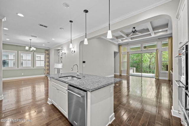 kitchen with white cabinets, appliances with stainless steel finishes, plenty of natural light, and coffered ceiling