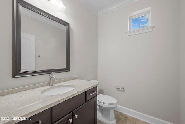 bathroom featuring crown molding, tile patterned flooring, vanity, and toilet