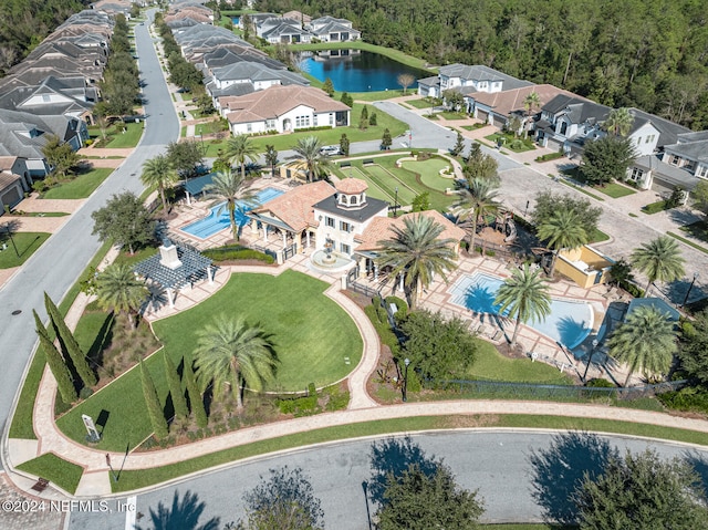 drone / aerial view with a water view