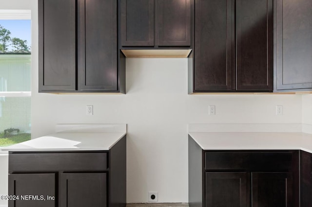 kitchen with dark brown cabinetry