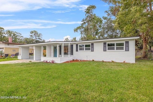 ranch-style house with a front yard