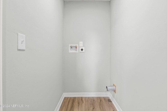 washroom featuring washer hookup, wood-type flooring, and electric dryer hookup