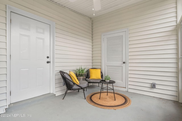 entrance to property featuring a patio