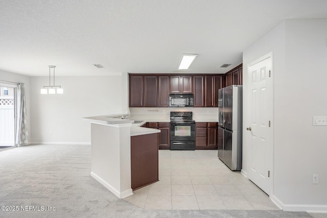 kitchen featuring sink, light carpet, kitchen peninsula, pendant lighting, and black appliances