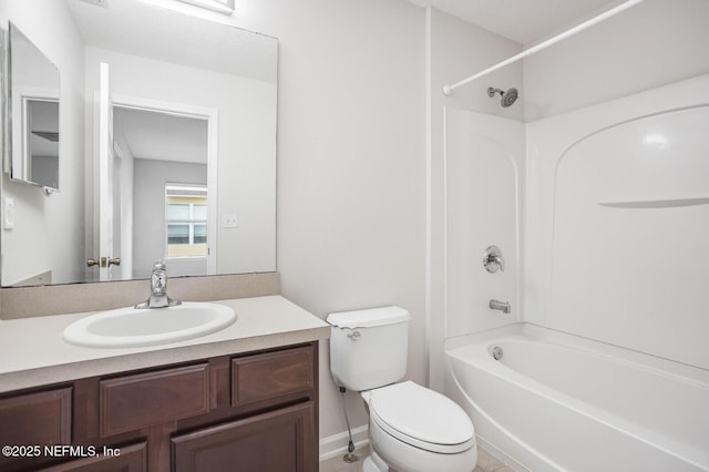 full bathroom with shower / tub combination, vanity, and toilet