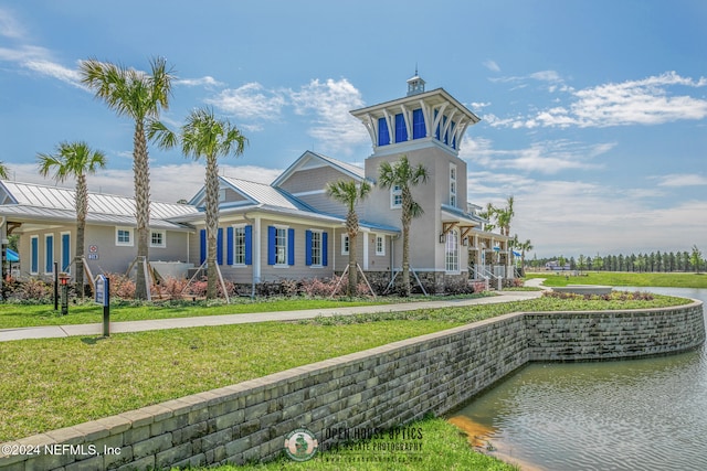 view of building exterior featuring a water view