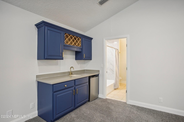 kitchen featuring light carpet, sink, blue cabinetry, lofted ceiling, and dishwasher