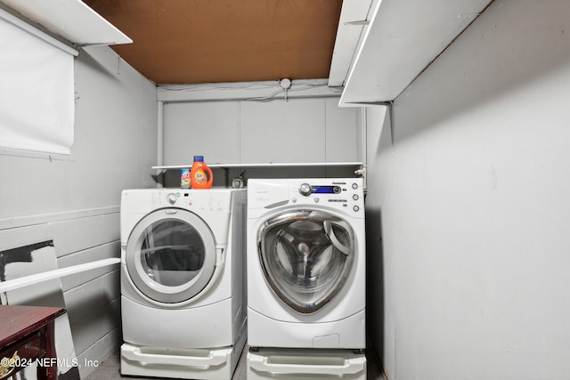 washroom featuring separate washer and dryer