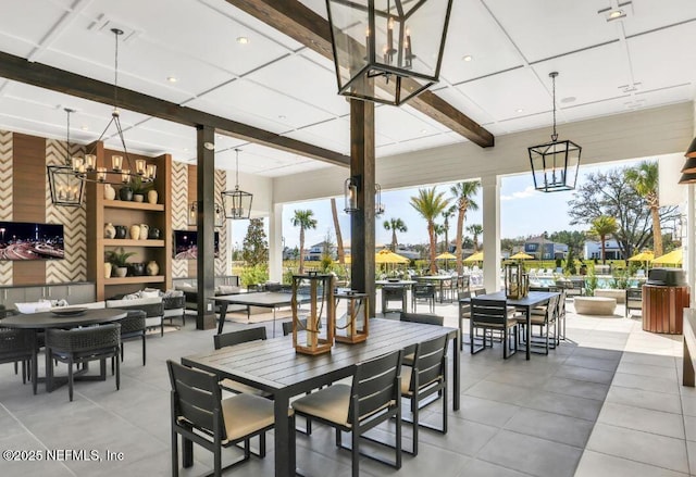 view of patio / terrace with outdoor dining area and an outdoor living space