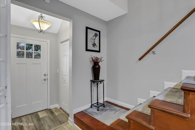 entryway with wood-type flooring