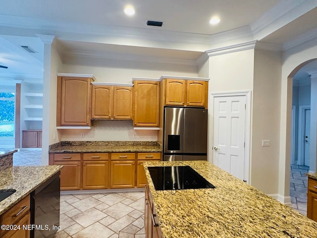 kitchen with light stone countertops, crown molding, and black appliances