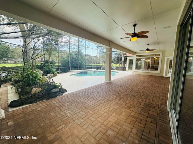 view of pool with a patio and a lanai