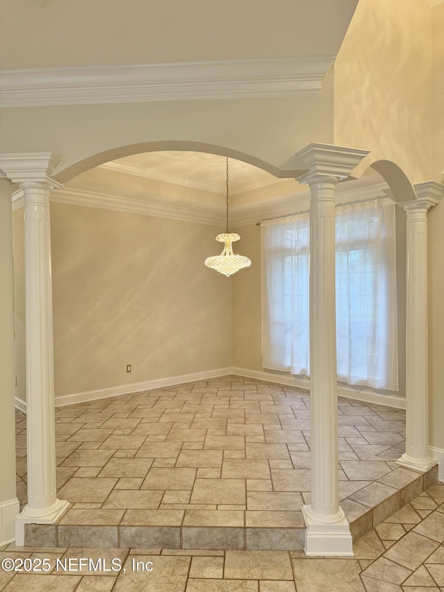 unfurnished dining area with decorative columns and ornamental molding