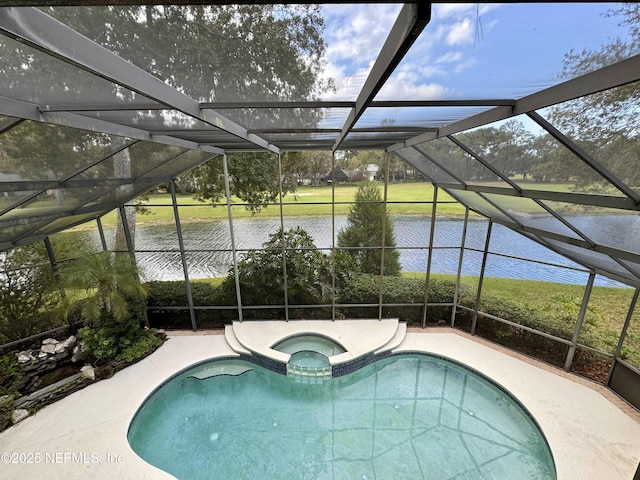 view of pool featuring an in ground hot tub, a water view, glass enclosure, and a patio