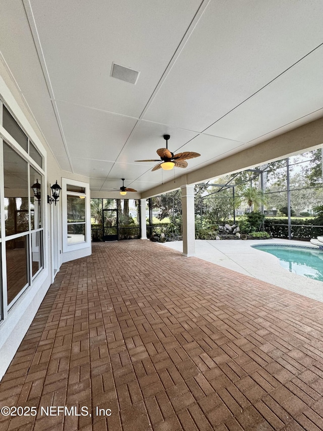 view of patio / terrace featuring ceiling fan