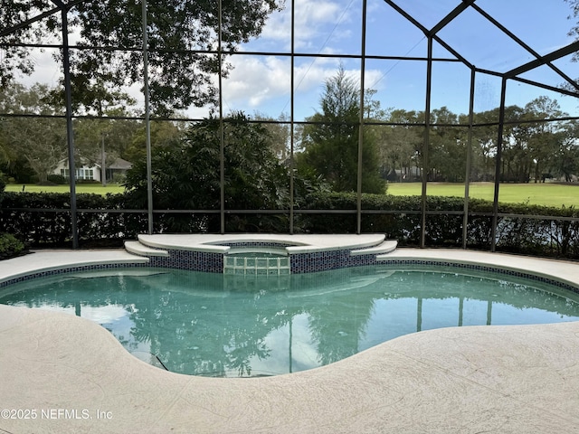 view of pool featuring an in ground hot tub and glass enclosure