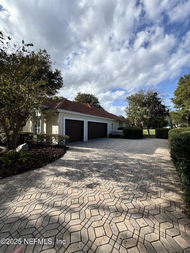 exterior space with a garage