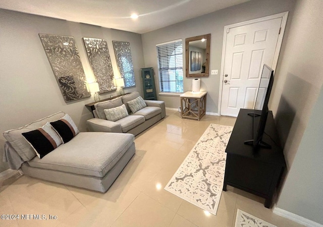 living room featuring light tile patterned floors